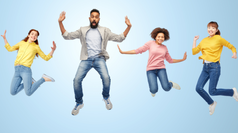 four people jumping 