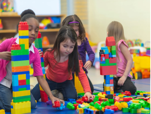 Children playing with building blocks