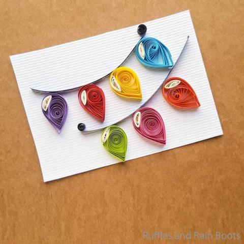 Card with Christmas lights made with quilling